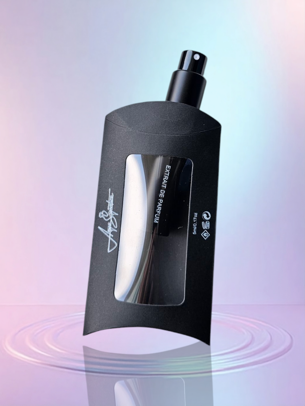 Douceur Amère travel-size perfume – sleek and portable extrait de parfum in a cylindrical design, perfect for on-the-go indulgence.